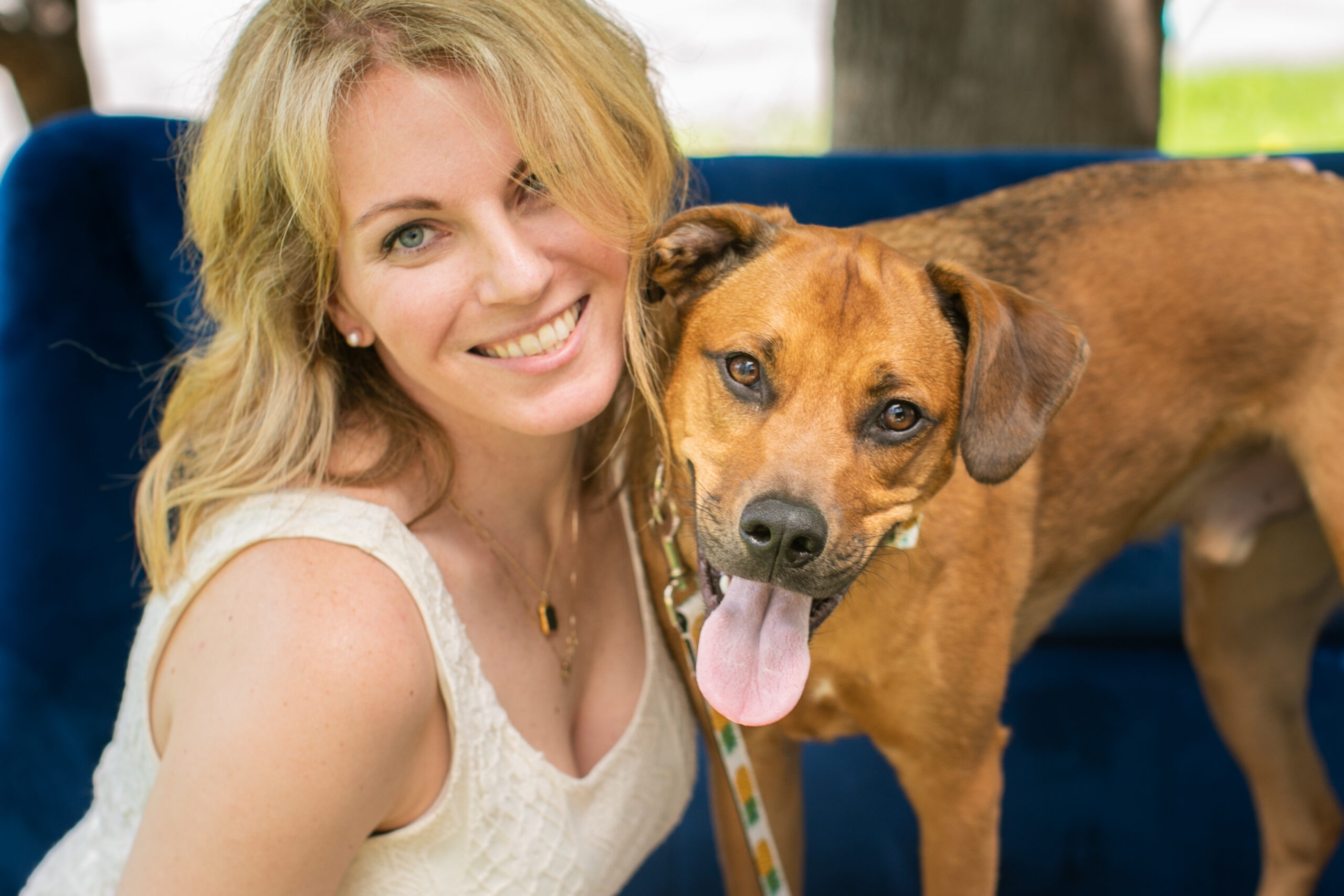 Doggy Social founder Lara Leinen poses with her rescue dog, Asbjorn.
